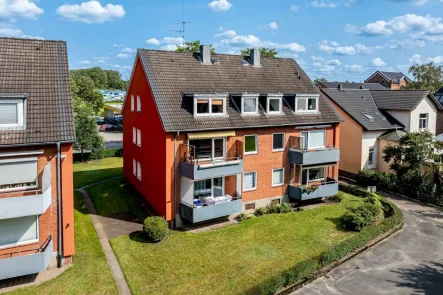 Rueckansicht 03 - Wohnung kaufen in Elmshorn - 3 1/2 -Zimmer- Eigentumswohnung mit Carportstellplatz in Elmshorn