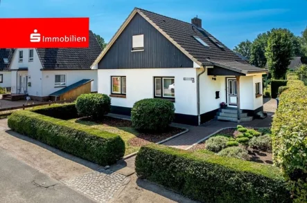 Ansicht Straße - Haus kaufen in Elmshorn - Charmantes Einfamilienhaus in beliebter Stadtrandlage!