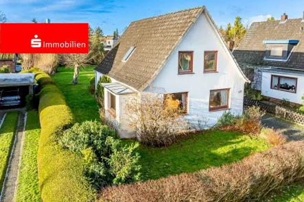 Vorderansicht 04 - Haus kaufen in Barmstedt - Idealer Einstieg ins Wohneigentum - kleines, solides Einfamilienhaus für den handwerklich begabten Interessenten in ruhiger Wohnlage von Barmstedt.