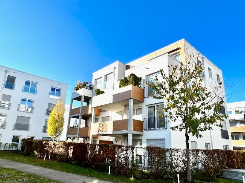 Außenansicht - Wohnung kaufen in Unterschleißheim - ATTRAKTIVE 2,5-ZIMMER-WOHNUNG MIT PENTHOUSE-CHARAKTER