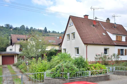 Außenansicht - Haus kaufen in Karlsruhe / Grötzingen - Siedlungshaus mit Potenzial: ein Ort für Ihre Ideen und Träume.