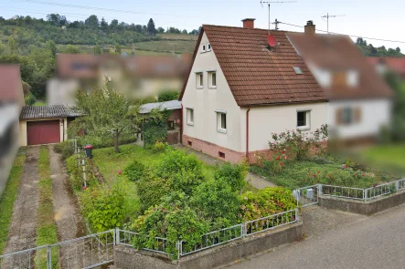 Haus mit Grundstück - Haus kaufen in Karlsruhe / Grötzingen - Siedlungshaus mit Potenzial: ein Ort für Ihre Ideen und Träume.