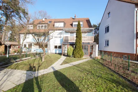 1 Vorderansicht - Haus kaufen in Fürth - Gut vermietetes 3-Familienhaus mit tollen Garten in Waldrandlage von Fürth-Stadeln