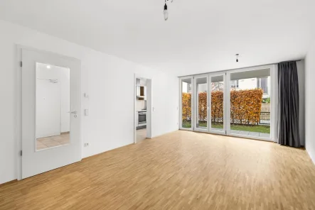 Wohnzimmer - Wohnung mieten in Augsburg - Ruhige, moderne 3-ZKB-Gartenwohnung mit EBK inmitten der Augsburger Innenstadt