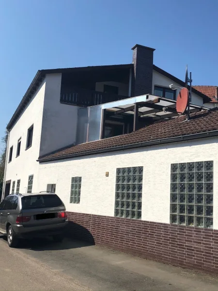  - Zinshaus/Renditeobjekt kaufen in Stadtallendorf - Investoren aufgepasst: Vielseitig nutzbares Zweifamilienhaus mit Gewerbeeinheit