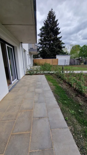 Terrasse - Wohnung kaufen in Berlin - Erstbezug! Neubauwohnung mit Terrasse und barrierefreiem Zugang in ruhiger Seitenstraße.