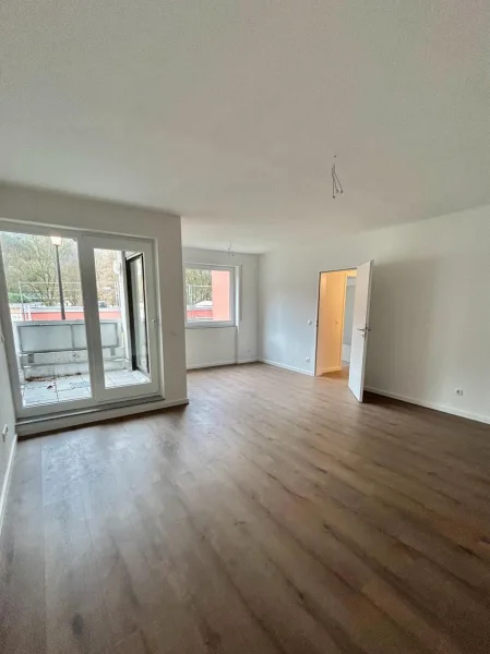 Wohnzimmer - Wohnung kaufen in Sinzig - Einzigartige Gelegenheit: Exklusive Wohnung in Toplage - frisch saniert und zum Verlieben schön!