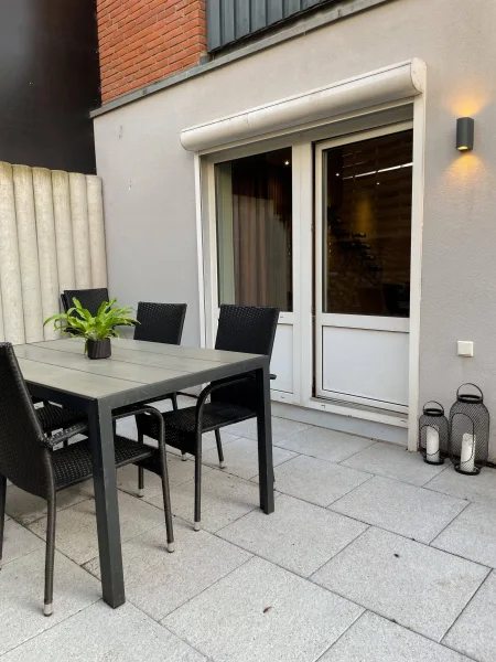 Terrasse-Souterrainwohnung