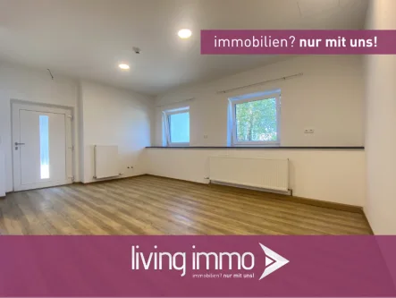 Startbild - Wohnung kaufen in Fürstenstein - Schön sanierte, geräumige 2-Zimmer-Wohnung mit Terrasse und Außenstellplatz