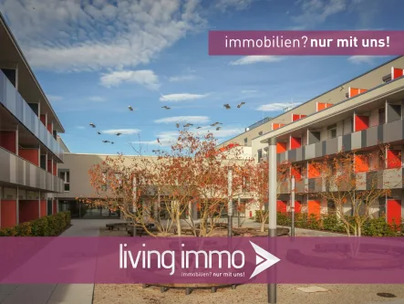 Außenansicht Herbst - Bildergalerie Apartmentanlage „unity α“ - Wohnung kaufen in München - Studentenapartment mit großzügiger Dachterrasse und Blick ins Grüne in München-Freimann