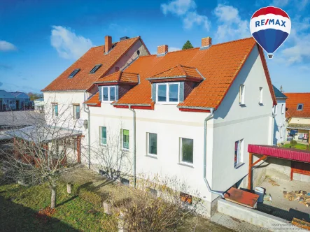 Mehrfamilienhaus - Haus kaufen in Altenweddingen - Vielseitiges Mehrfamilienhaus mit großem Grundstück in Altenweddingen