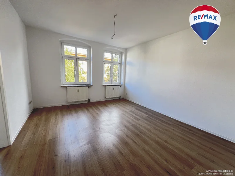 Wohnzimmer - Wohnung mieten in Magdeburg / Stadtfeld Ost - Urbanes Wohnvergnügen: Geschmackvoll renovierte 3-Zimmer-Wohnung mit Balkon!