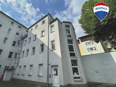 Außenansicht - Wohnung kaufen in Magdeburg - Exklusive Investitionsgelegenheit: Charmante Maisonettewohnung in Magdeburg Sudenburg!