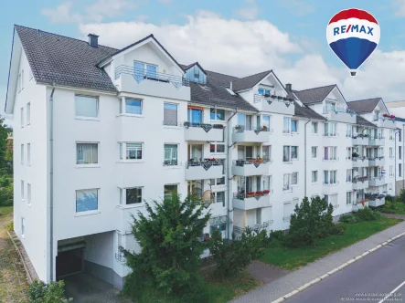 Hausansicht - Wohnung kaufen in Magdeburg - Charmante Eigentumswohnung mit Balkon + Blick ins Grüne + TG-Stellplatz