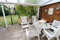 Terrasse mit Pergola und Markise