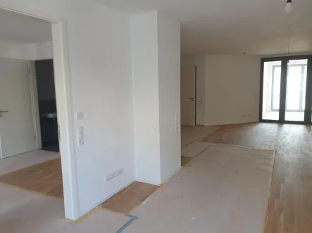 Blick in die Wohnung - Wohnung kaufen in Bonn / Castell - NEUBAU - TOP LAGE: Hochwertige 2 Zimmer Wohnung mit Wintergarten und zwei Bädern! - Provisionsfrei -