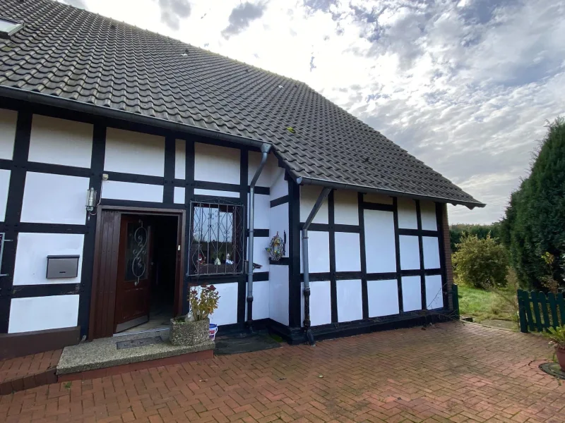 Ansicht - Haus kaufen in Osnabrück - Ländlich wohnen am Rande der Großstadt. Genießen Sie den Blick über Wiesen und Felder!