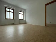 Wohnzimmer mit angrenzendem Schlafzimmer