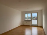 Wohnzimmer mit Balkon