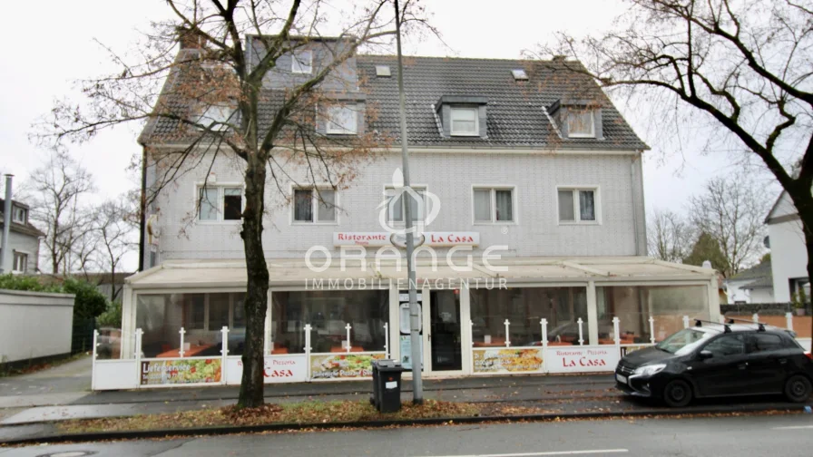 Haus_Straßenansicht - Haus kaufen in Duisburg / Großenbaum - ***Für Kapitalanleger - Mehrfamilienhaus mit Gewerbeeinheit in begehrter Lage***