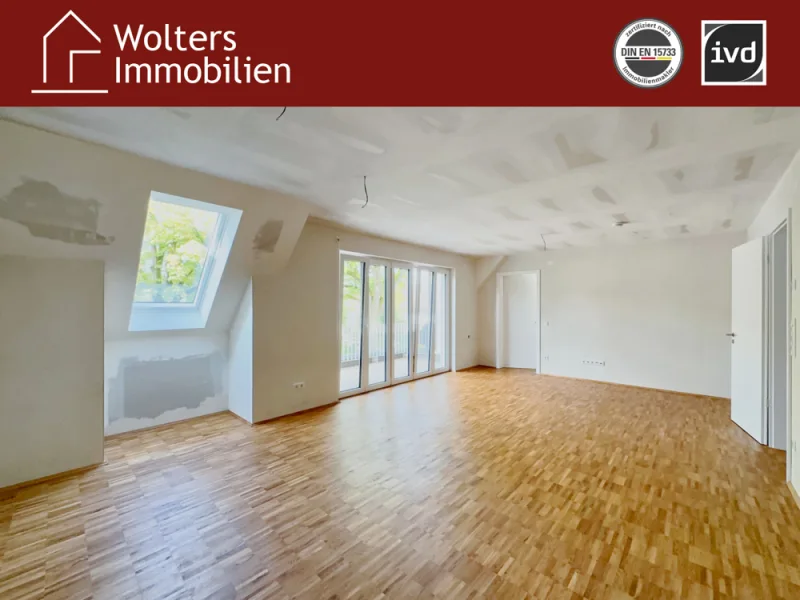 Wohn-, Esszimmer & Küche - Wohnung kaufen in Gütersloh - Moderne Neubauwohnung mit Balkon und zusätzlichen Ausbaumöglichkeiten im Dachgeschoss!