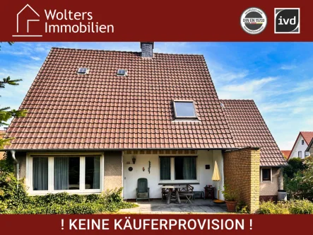 Hausansicht Gartenseite - Haus kaufen in Rheda-Wiedenbrück - Charmantes Einfamilienhaus in schöner Siedlungslage von Rheda!