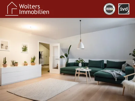 Wohnzimmer (Beispielmöblierung) - Wohnung kaufen in Gütersloh - 3-Zimmer ETW mit Balkon und TG-Platz im Herzen von Friedrichsdorf!