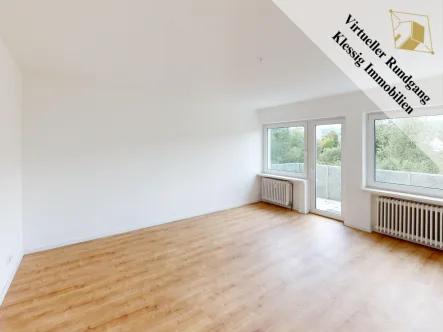 Wohnzimmer - Wohnung kaufen in Bad Driburg - Gepflegte 3-Zimmer-Wohnung in Bad Driburg – Frisch renoviert mit Blick ins Grüne