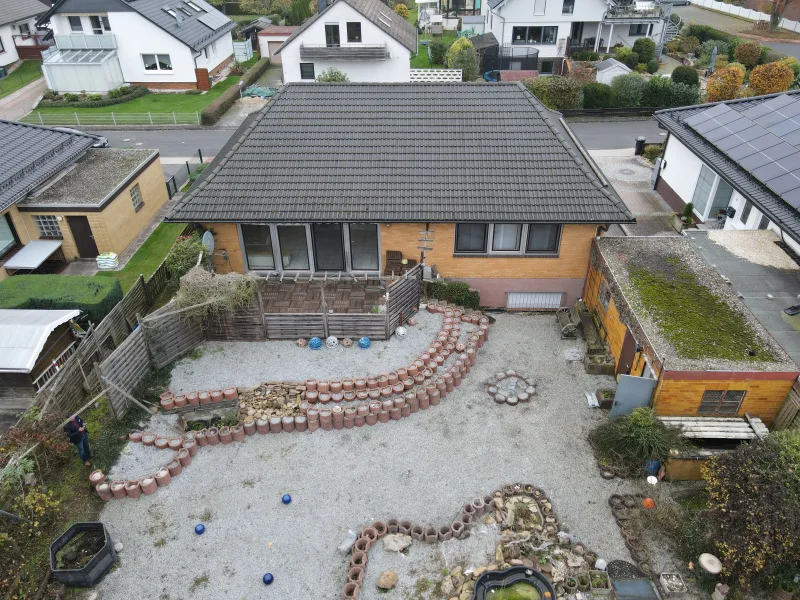 Luftbild - Haus kaufen in Espenau - Bungalow mit kleiner Einliegerwohnung