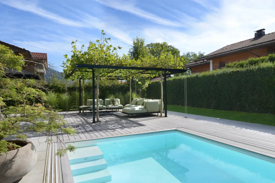 Wohlfühloase mit Pool - Wohnung kaufen in Bad Wiessee - Stilvoller Rückzugsort in Seenähe