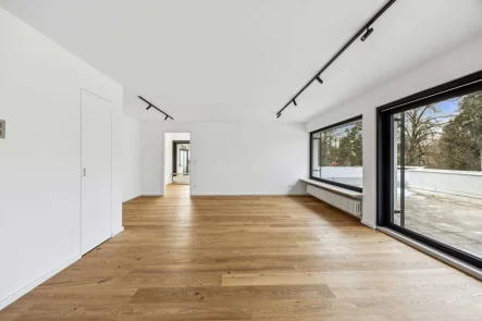 Wohnen - Wohnung mieten in München - Luxuriöses Penthouse mit Dachterrasse und Ausblick auf eine historische Villa mit Parkanlage