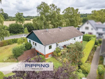 Titelbild - Haus kaufen in Wohltorf - Platz für die ganze Familie:"Großzügiges Einfamilienhaus in ruhiger Lage von Wohltorf"