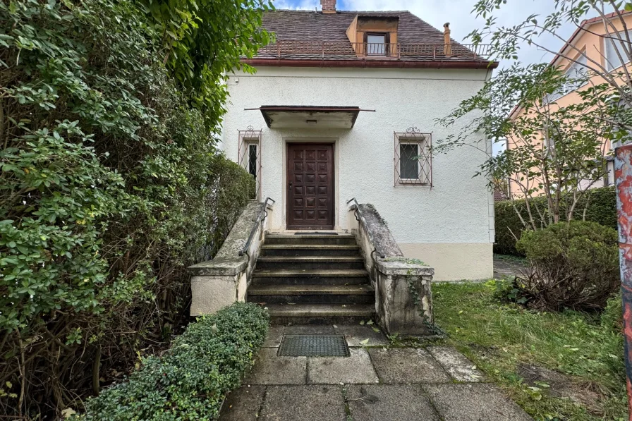 Titelbild - Haus kaufen in Karlsfeld - Charmante Doppelhaushälfte in familienfreundlicher Lage von Karlsfeld zu verkaufen!