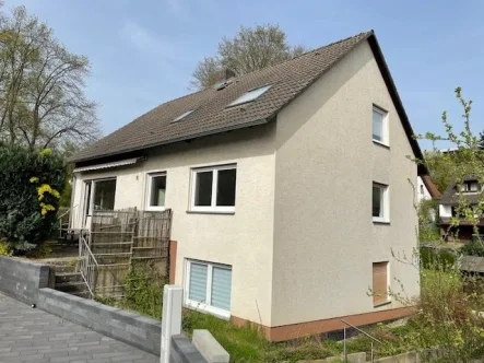 Ansicht - Haus kaufen in Kassel - Charmantes Haus mit idyllischem Ambiente in Kassel-Wolfsanger!