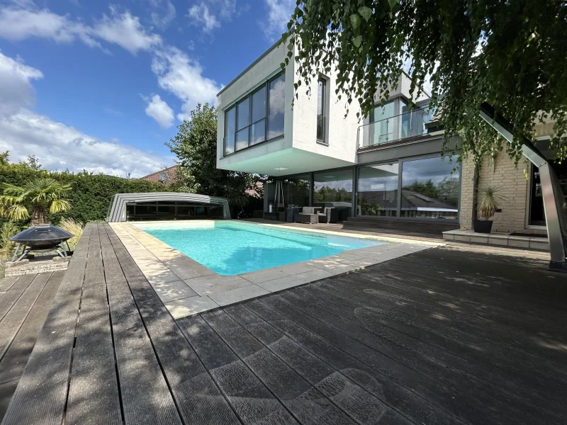 Blick auf den Anbau - Haus kaufen in Baunatal - Exklusives Einfamilienhaus in Baunatal-Altenritte