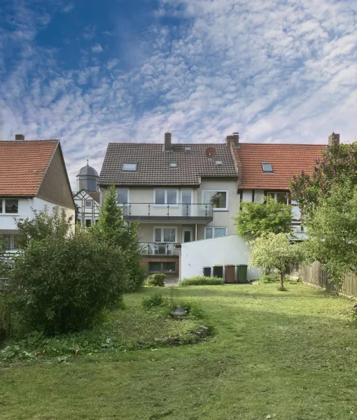 Rückansicht - Haus kaufen in Fuldabrück - Gepfl. Haus mit ELW in ruhiger, zentraler Lage von Fuldabrück-Dörnhagen