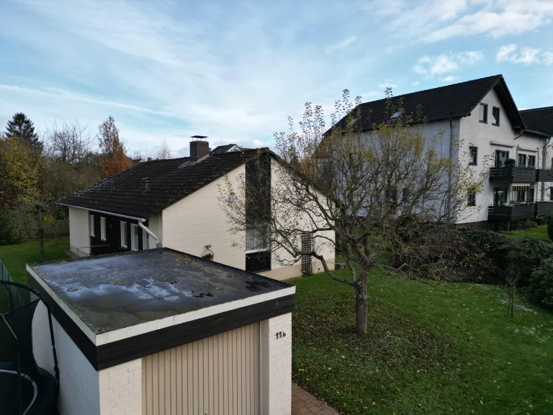 Vorderansicht - Haus kaufen in Kassel - Charmantes Einfamilienhaus im skandinavischen Stil in Kassel-Oberzwehren!