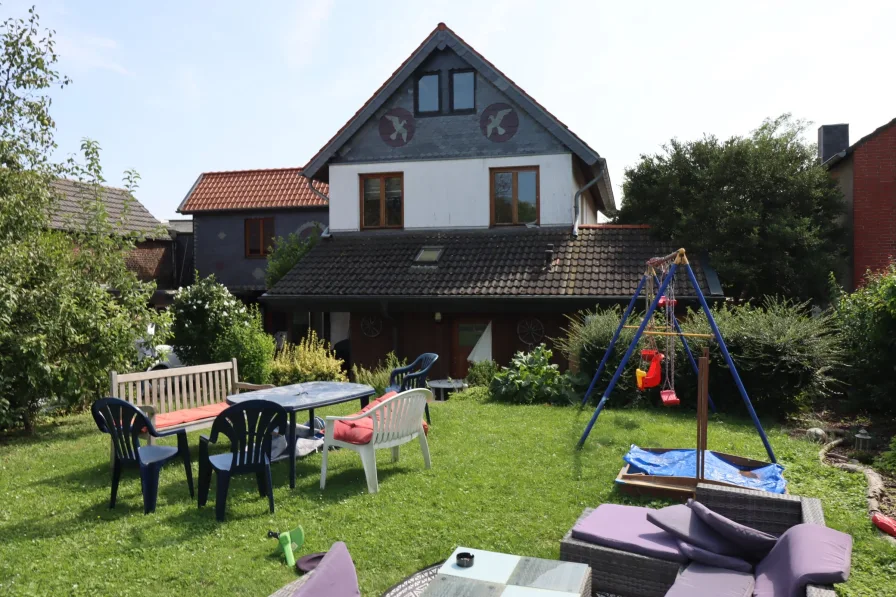 Gartenansicht - Haus kaufen in Jüchen - Raumwunder mit diversen Nutzungsmöglichleitenin Jüchen-Stessen...