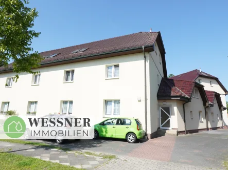 Titelbild - Haus kaufen in Falkensee - Investitionsmöglichkeit mit hohem Steigerungspotential: 3 Mehrfamilienhäuser mit 11 Wohneinheiten