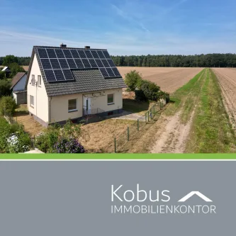 Titelbild - Haus kaufen in Suhlendorf / Dallahn - Einfamilienhaus mit PV-Anlage in direkter Feldrandlage