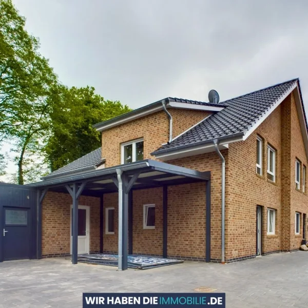 Außenansicht - Haus kaufen in Westoverledingen - FAMILIE, GARTEN | Neubau Doppelhaushälfte nahe FLACHSMEER | Papenburg