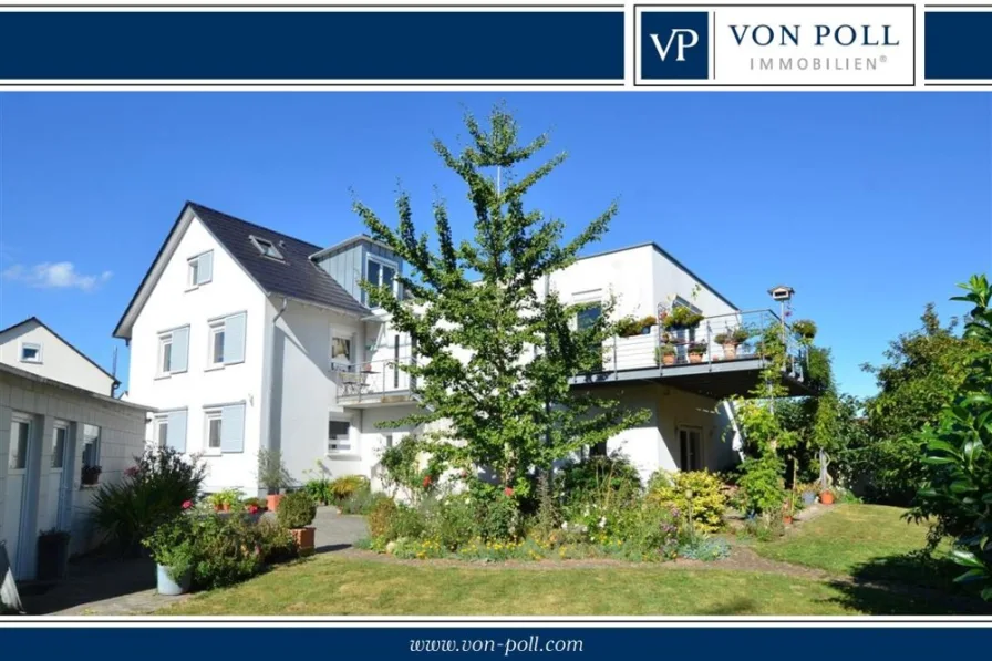 Ansicht vom Garten (2) - Haus kaufen in Herxheim bei Landau/Pfalz - Ruhig gelegenes Anwesen mit zwei Einheiten auf 322m² Wohn-/Nutzfläche und sonnigem Garten