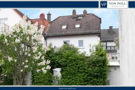 Gartenansicht-logo - Haus kaufen in Dreieich - Charmantes Familienhaus mit sonnigem Garten