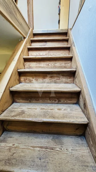 Treppe in das ausgebaute Dachgeschoss