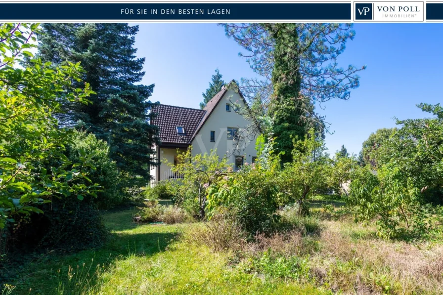 Titelbild - Haus kaufen in Falkensee - Idyllisch gelegenes EFH mit großem Naturgrundstück!