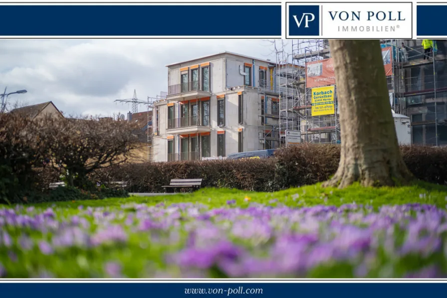 Titelbild - Wohnung kaufen in Offenbach am Main - Luxuriöse Drei-Zimmer-Erdgeschosswohnung mit Garten im Erstbezug