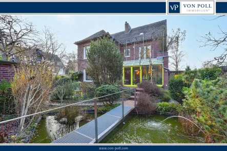 Titelbild - Haus kaufen in Düsseldorf - Grüne Oase mitten in der Stadt - Einfamilienhaus mit Gewerbeeinheit