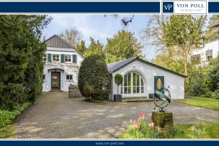 Von Poll Immobilien - Haus kaufen in Düsseldorf - Sylter Charme in Düsseldorf - Klassische Landhausvilla direkt am Rhein