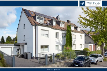 Titelbild - Haus kaufen in Düsseldorf - Modernes 3-Familienhaus mit traumhaften Garten !