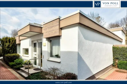 Titelbild - Haus kaufen in Bad Homburg - VON POLL - BAD HOMBURG: Top gepflegter Atriumbungalow mit zwei Einzelgaragen in Bad Homburg